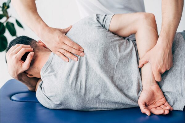 Chiropractor adjustment a patients spine