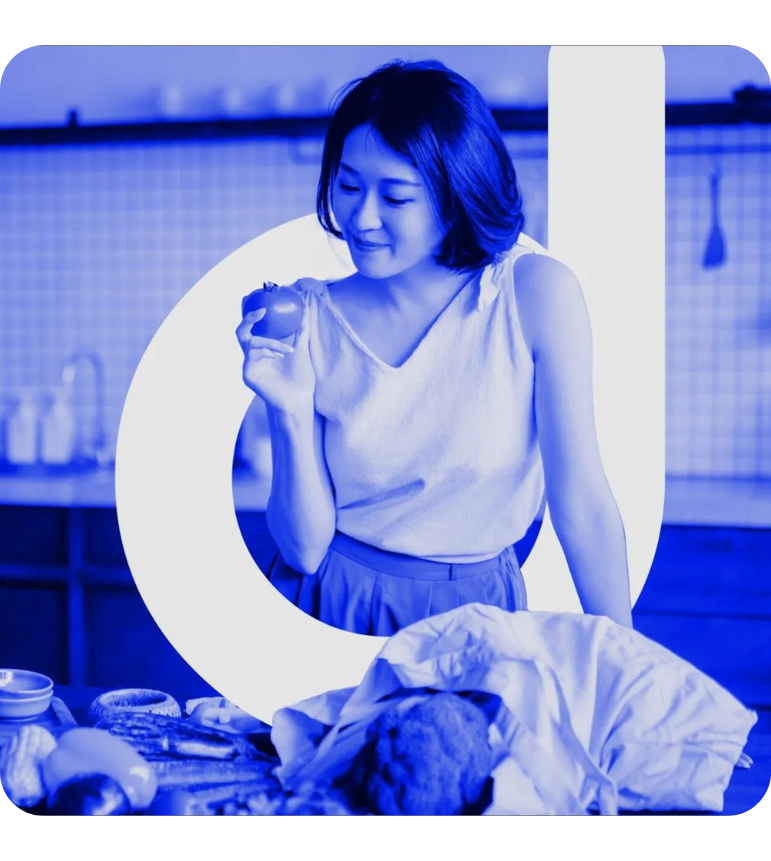 Woman holding an apple with a "D" in the background for Registered Dietitian