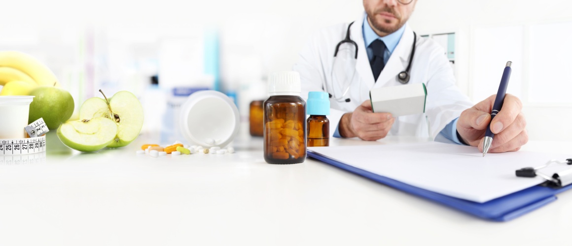 Clinical dietitian filling out a prescription